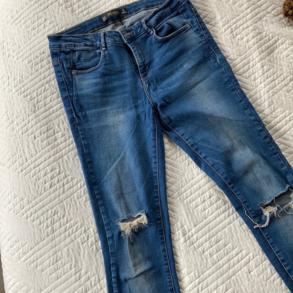 Zara distressed denim with zipper hem